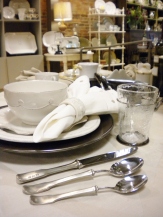 Graham registered for the Juliska “Berry and Thread” everyday dinnerware and the “Hugo” glassware and for Match “Olivia” flatware. Currently favored by many brides, Juliska is “durable and lovely—quite the win-win,” says Graham. Her setting is featured with a Juliska pewter charger, napkin, and ring.